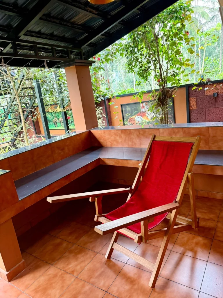 A red easy chair on the sit-out