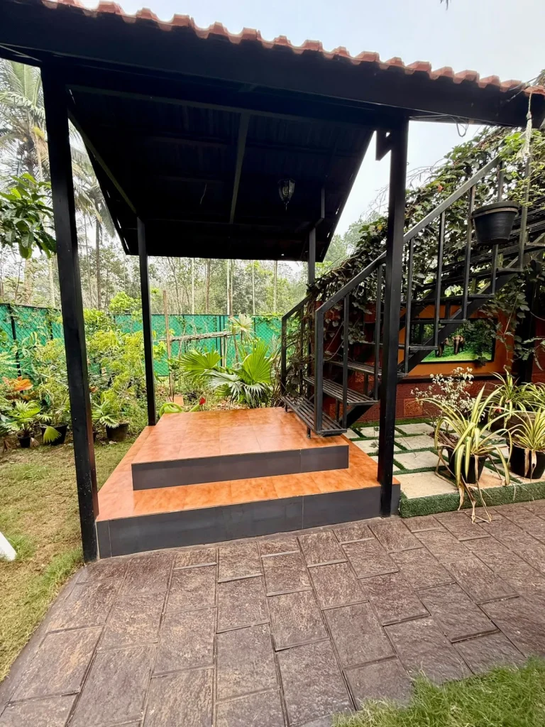Wooden deck and steps beside the house